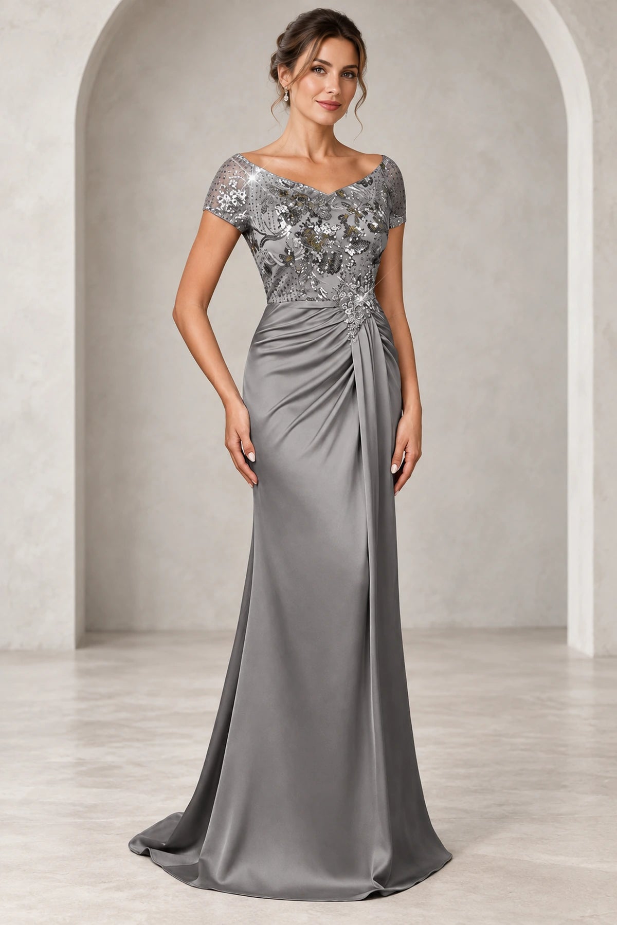 ilver gray Mother of the Bride Dress with sequined sweetheart bodice short sleeves ruched waist and floor length sheath skirt