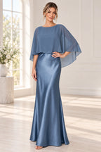 Slate blue mother of the bride dress with bateau neckline cape overlay fitted sheath silhouette and floor-length skirt
