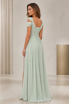 Back view of soft sage bridesmaid dress with off-shoulder straps, lace-up back and flowing floor-length A-line skirt