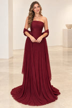 Graceprom burgundy chiffon wedding guest dress with a strapless ruched bodice, pleated A-line skirt, sweeping train and matching wrap.