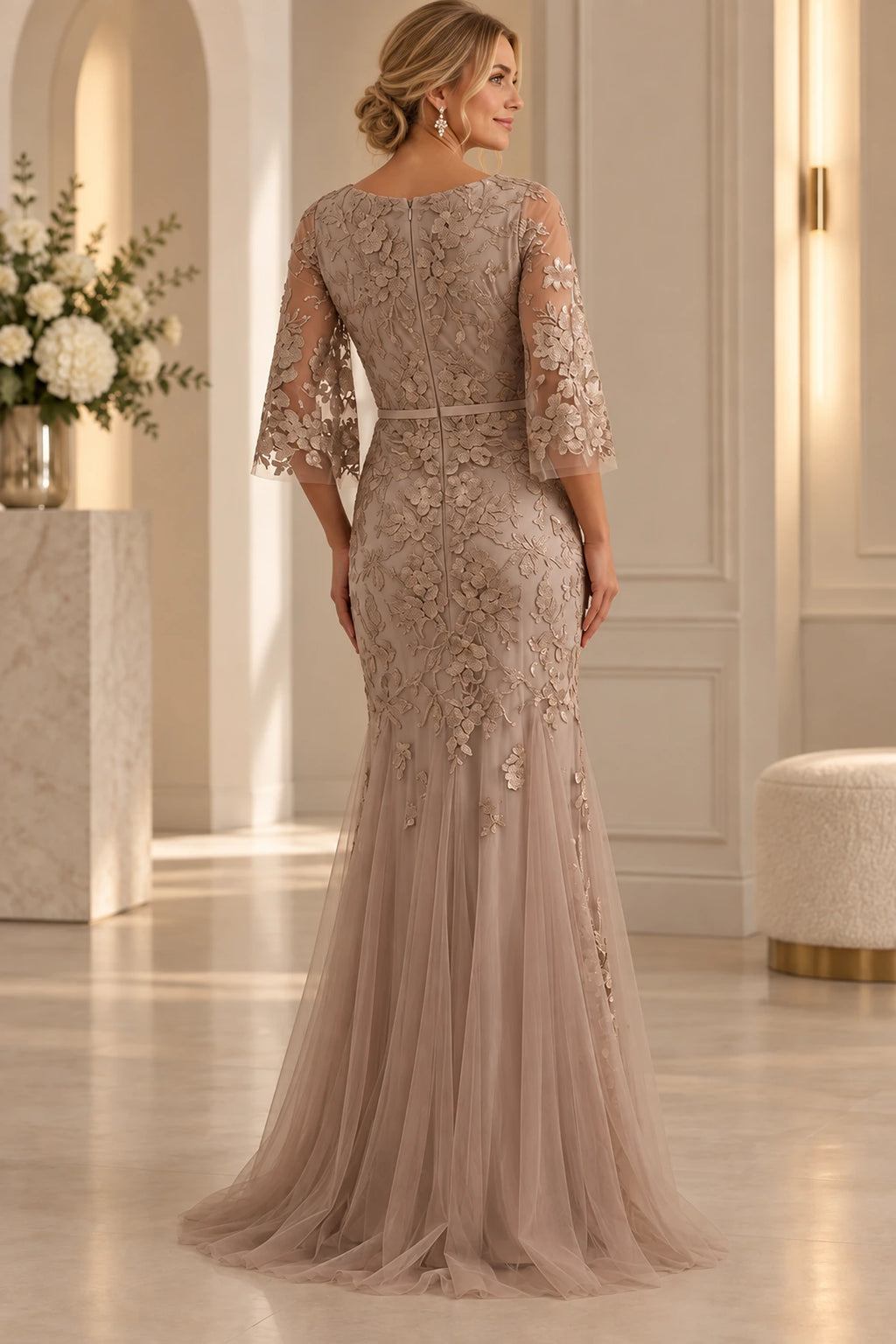 Back view of taupe champagne Mother of the Bride Dress with floral lace, center zipper and sheer tulle sweep train