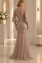 Back view of taupe champagne Mother of the Bride Dress with floral lace, center zipper and sheer tulle sweep train