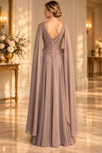 Back view of taupe Mother of the Bride Dress with deep V-back, embellished bodice, flowing cape panels and floor-length A-line skirt