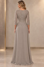Back view of taupe gray Mother of the Bride Dress with lace bodice, center zipper and floor-length A-line skirt