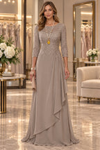 Taupe mother of the bride dress with bateau neckline lace bodice three quarter sleeves and draped skirt