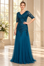 Teal blue Mother of the Bride Dress with V-neck, floral lace bodice, three-quarter sleeves and flowing floor-length skirt