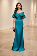 Teal satin evening dress with off-shoulder neckline, puff sleeves, wrapped bodice and mermaid floor-length silhouette