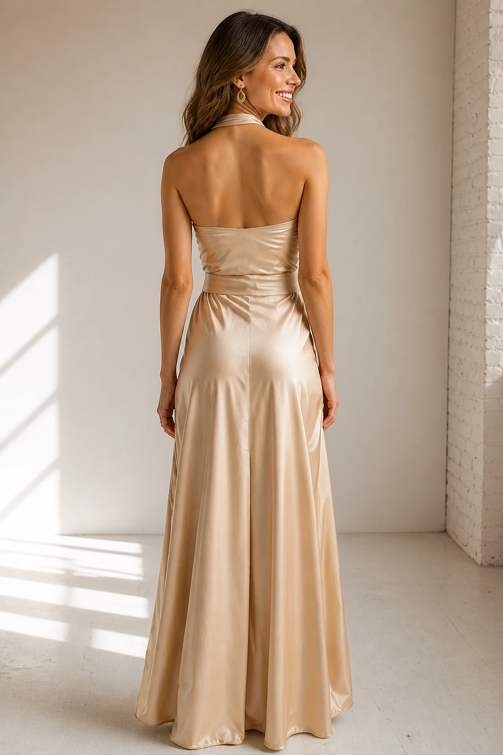 Back view of Vedress champagne satin open‑back halter formal gown