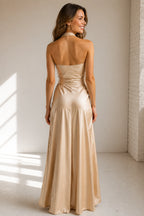 Back view of Vedress champagne satin open‑back halter formal gown