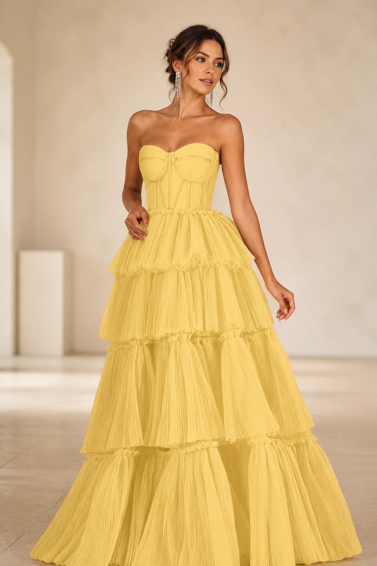 Yellow sweetheart strapless tiered floor-length ball gown prom dress front view
