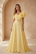 Yellow A-line V-neck prom dress with floral ruffle shoulder detail and short sleeves